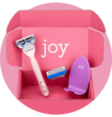 joy shave kit in pink box with razor, refill, and razor stand
