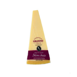 A front view of our Italian Granino Cheese Wedge, packaged.