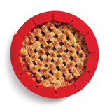 Adjustable Pie Crust Shield in use on a baked pie., image opens a dialog.