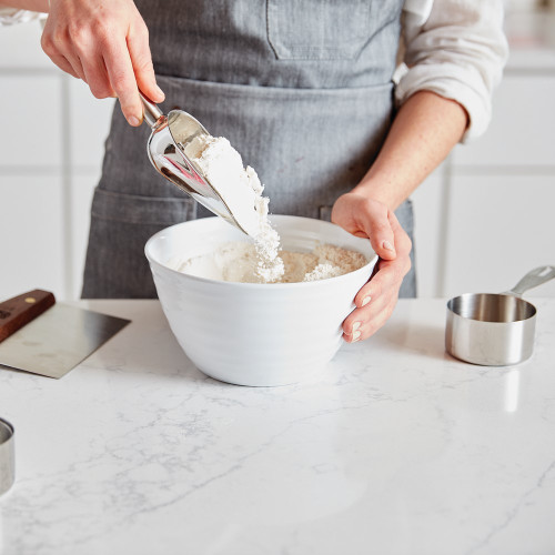 King Arthur Medium Scoop in use, scooping flour into a bowl.